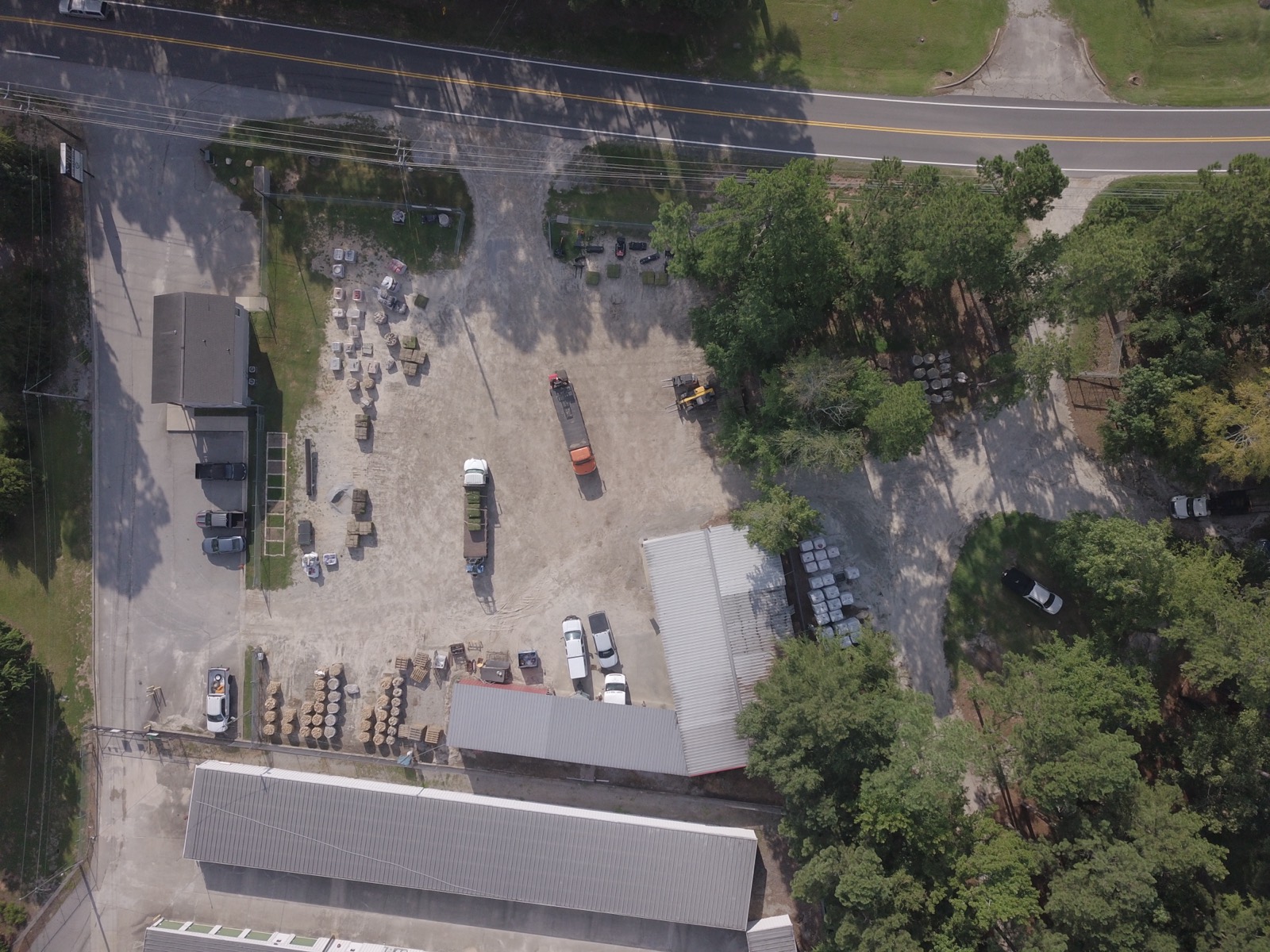 Aerial view of the Sod Brokers yard with pallets of sod staged among the buildings